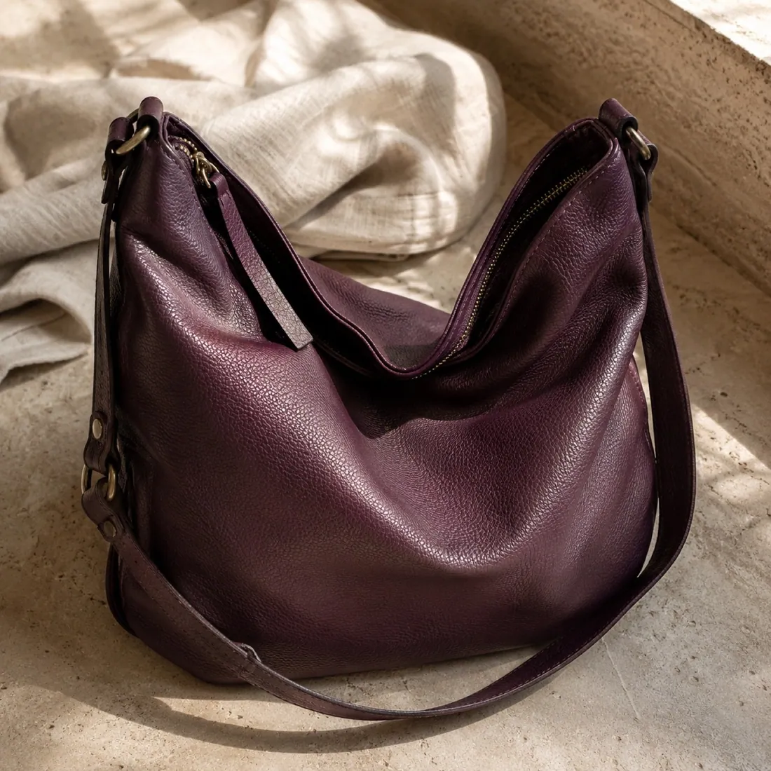 Carina quilted phone bag in deep plum