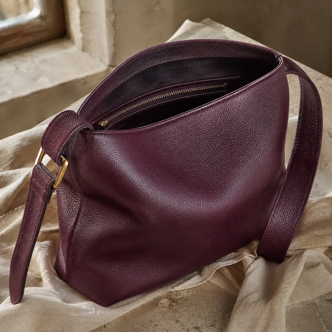 Vesper drawstring pouch bag in deep plum