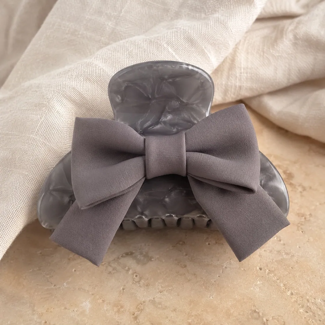 Rimini bow hair clip in stone grey